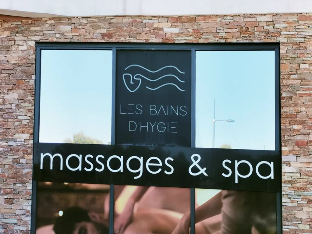 Pose de film solaire sur vitrine pour Les Bains d'Hygie à Castelnau-sur-Lez